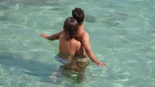 Girl gave the guy a handjob underwater in the sea