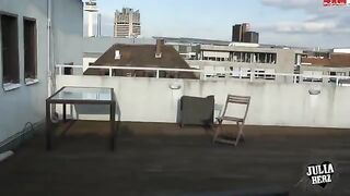 A hot brunette with big beautiful tits has sex right on the roof in HD quality
