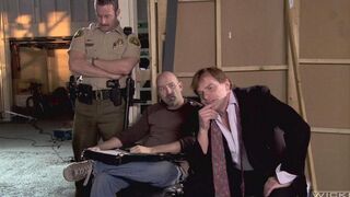 The boss is fucking his secretary on the table in his office