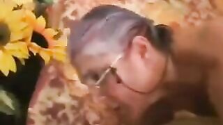 A man fucked a sexy gray-haired woman in black stockings