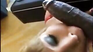 Two black men with huge cocks fuck a young woman in a threesome