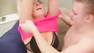 A hot grandma has sex in a chair with her young grandson - Eporn