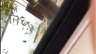 A guy came out to the street and began to play with his cock
