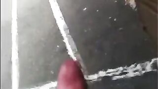 A guy came out to the street and began to play with his cock