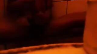 Firstly, the girl washed herself under the shower head, then she indulged