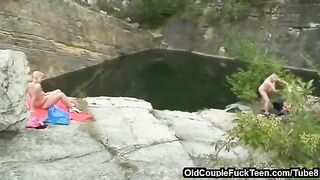 A mother and her daughter are having fun with their dad