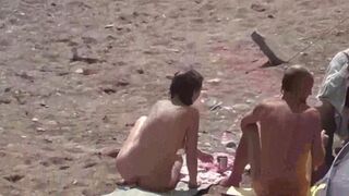 Two sexy naked girls bathing in the sea, enjoying a sensual moment