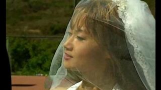 An Asian girl is fucking with a guy on the tennis court