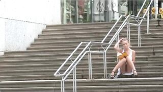 Girl walks on the street without panties, it's bold