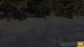 A hot girl is having fun on a sled by the fireplace with someone