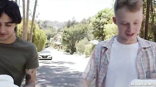 A hot MILF is getting fucked by two young boys in a steamy threesome