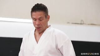 A girl is having sex in an uncomfortable pose under the coach’s guidance