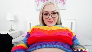 A young girl is making a gift for her stepdad