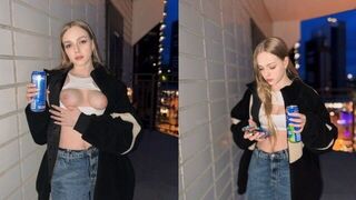 A girl showed more than just her tits for the energy drink advertisement