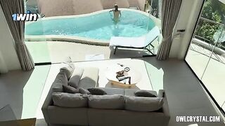 A beautiful girl has a alone vacation in the swimming pool