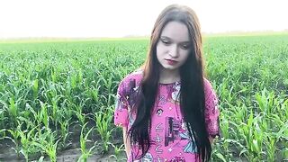 A hot chick is getting fucked in the cornfield