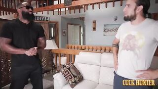 The man is fucking his girlfriend on the couch in front of him