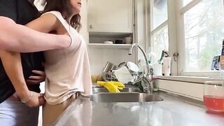 A hot and mature woman with big tits fucks her husband in the kitchen