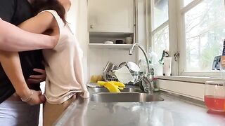 A hot and mature woman with big tits fucks her husband in the kitchen