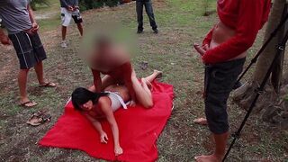 Bunch of wet pussies gets fucked on the beach in an orgy