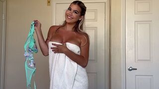 She gets rid of her clothes like a wrapper from a piece of candy