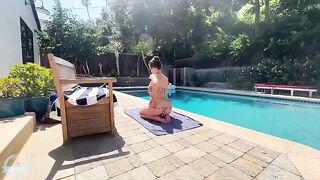 A big-breasted brunette milf is fucking with a young guy by the pool