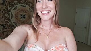 A woman with big tits has a breast massage with shimmering oil