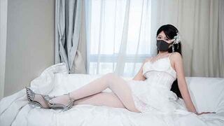 An Asian girl got fucked by her ex-boyfriend in the wedding dress