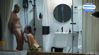 Shower stall is too small for two, but they manage
