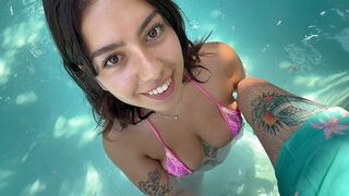 A girl in sexy bikini asks if she can give a blowjob by the pool