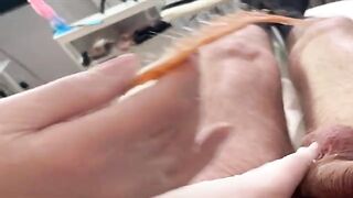 A hot Russian girl waxes a guy’s dick in a steamy homemade vid