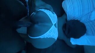 A man holds an ebony beauty by the hips and takes her hard